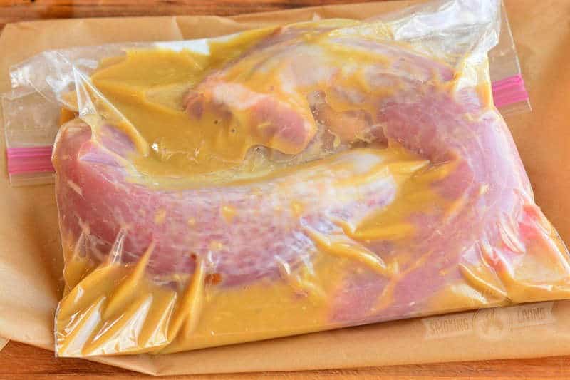 pork tenderloins in a zip lock bag with marinade