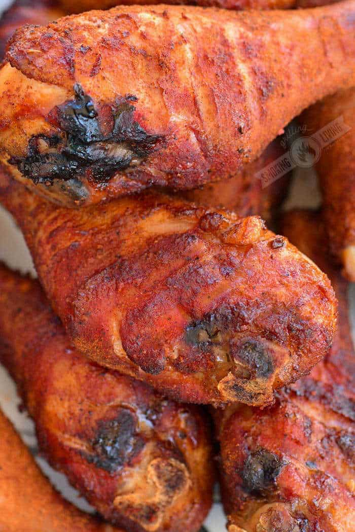 close up of smoked chicken drumsticks