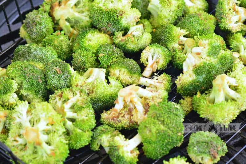 uncooked broccoli on the grill