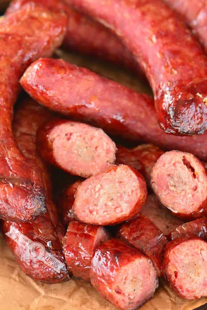 whole cooked sausage and sliced sausage