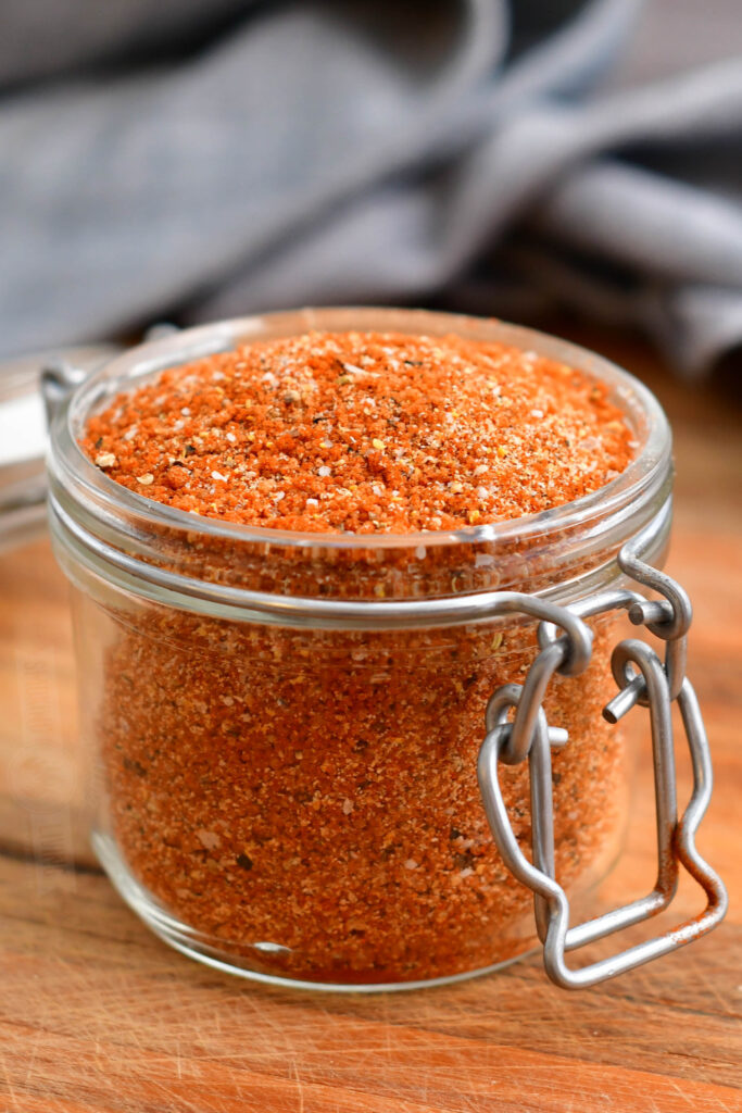 closeup of glass jar filled with dry rub for ribs