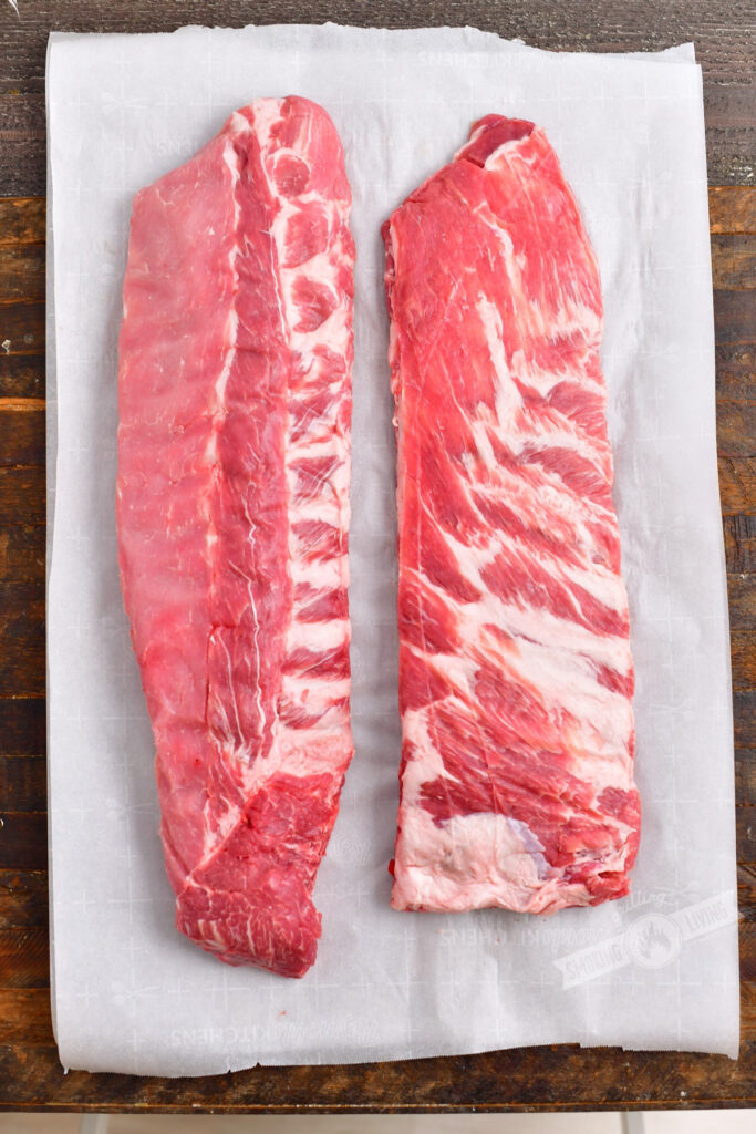 raw rack of baby back ribs and St Louis cut ribs side by side