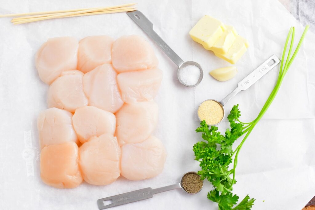ingredients for grilled scallops on the white paper