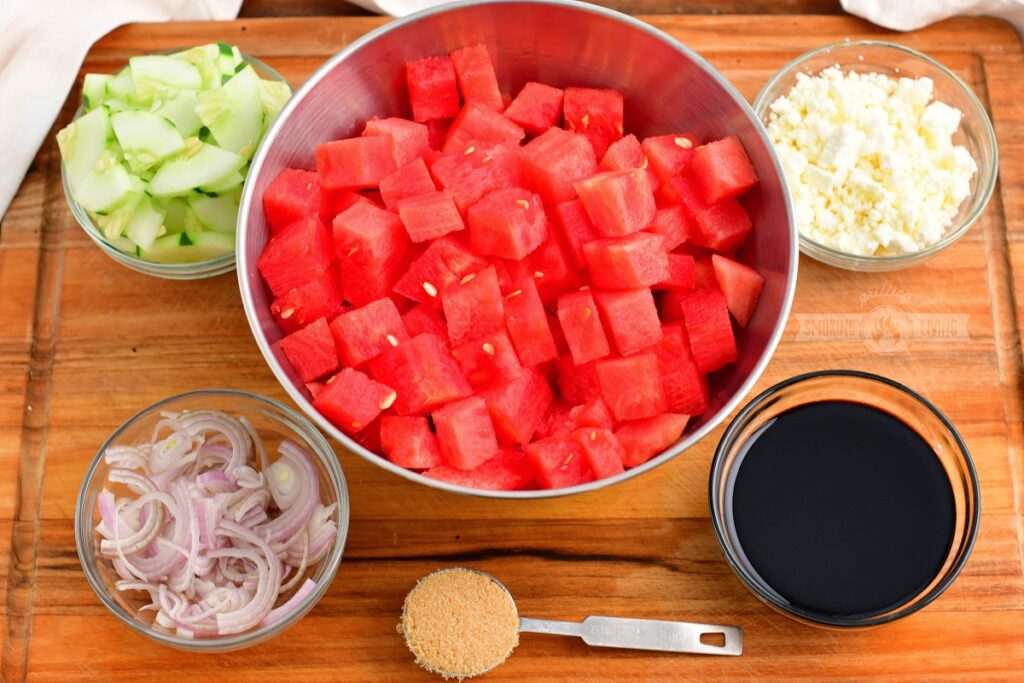 ingredients for watermelon feta salad on a cutting board