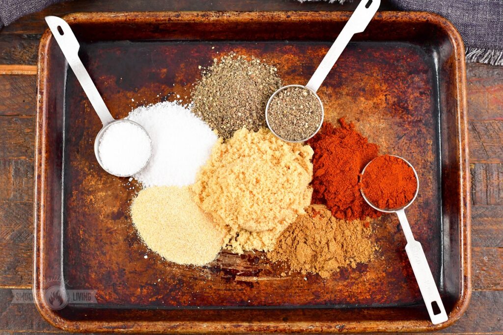 spices for the beef rub on the tray and spoons