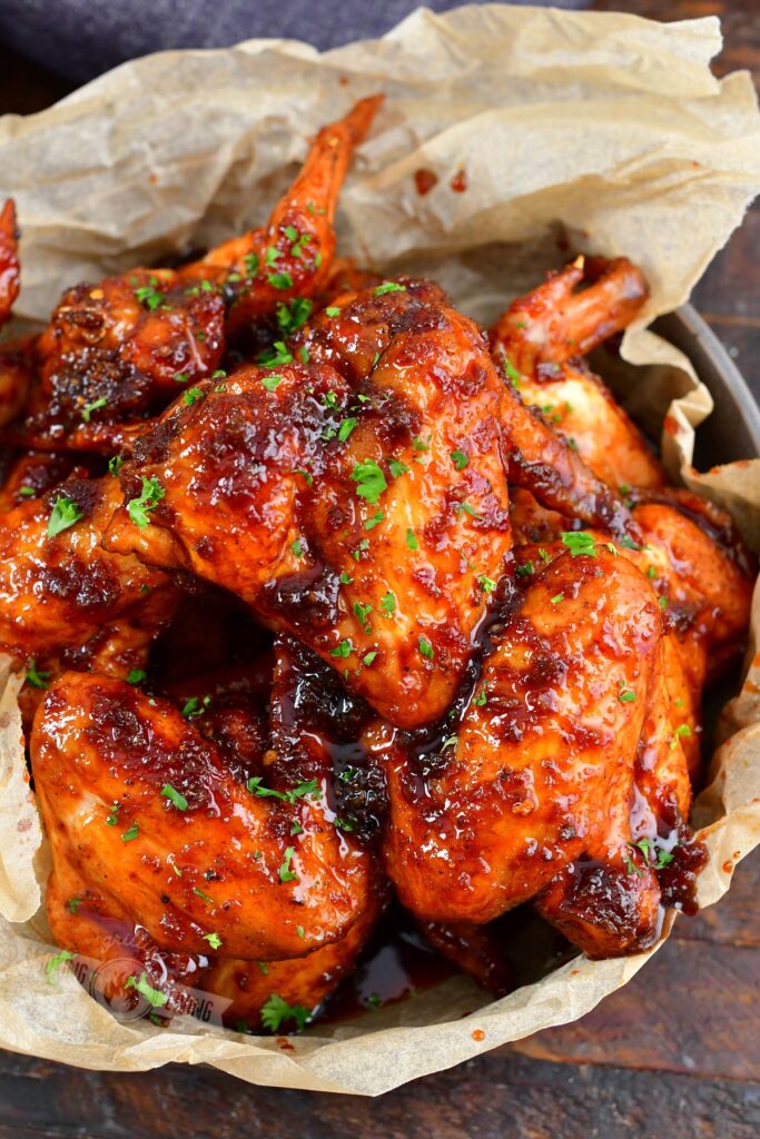 top view of basket with glazed chicken wings