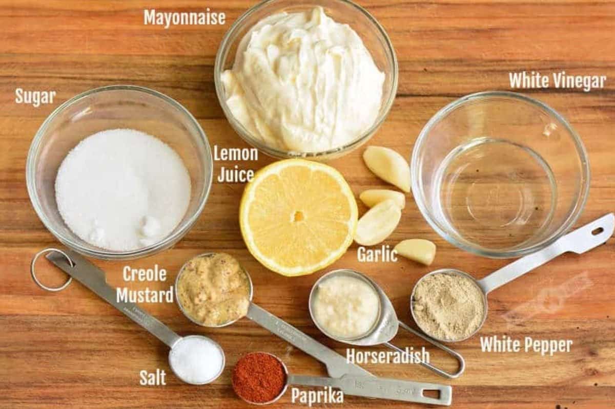 labeled Ingredients for white BBQ sauce on a wood surface.